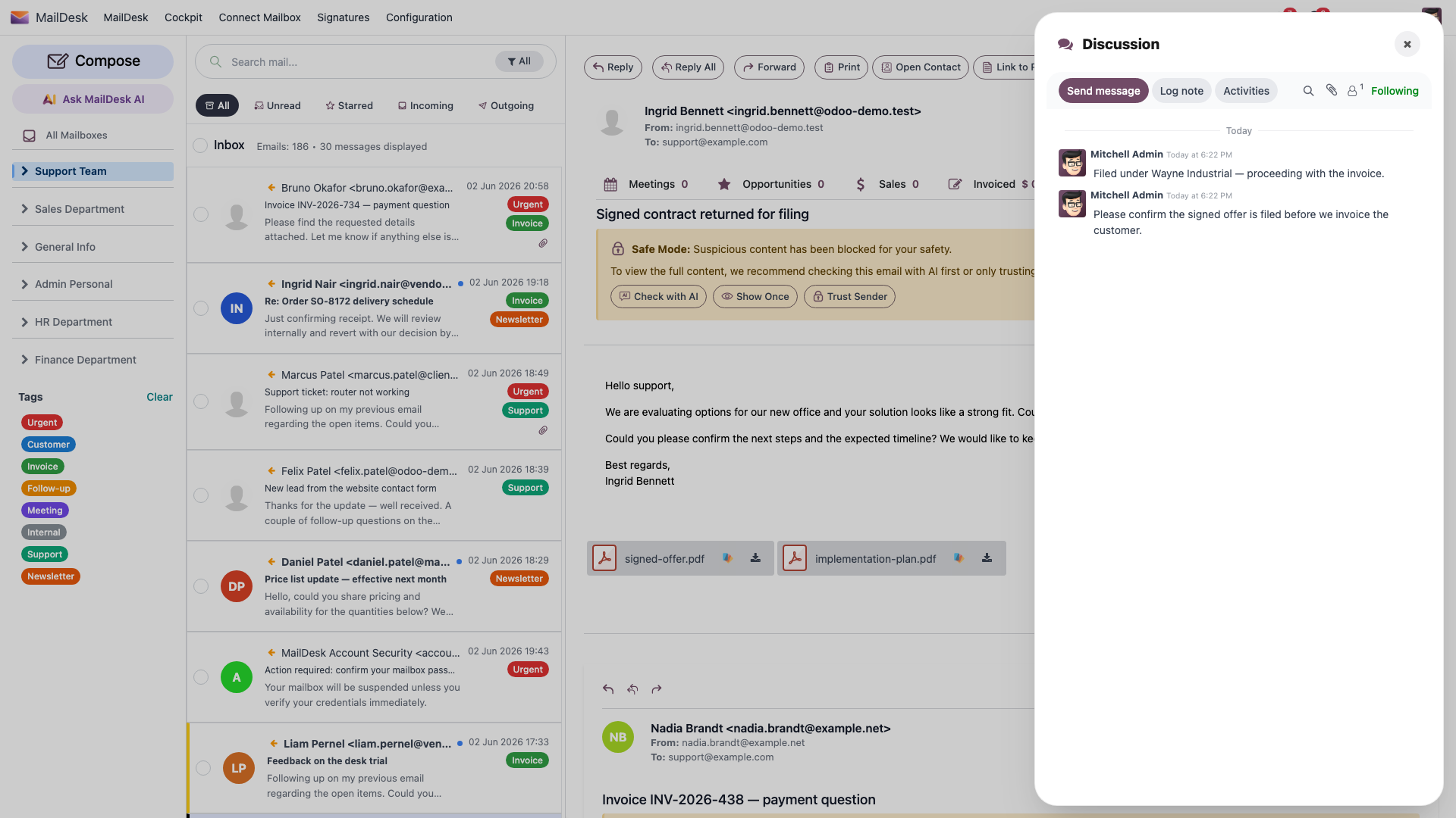 An open email with two PDF attachments listed below the message body, each with preview and download controls